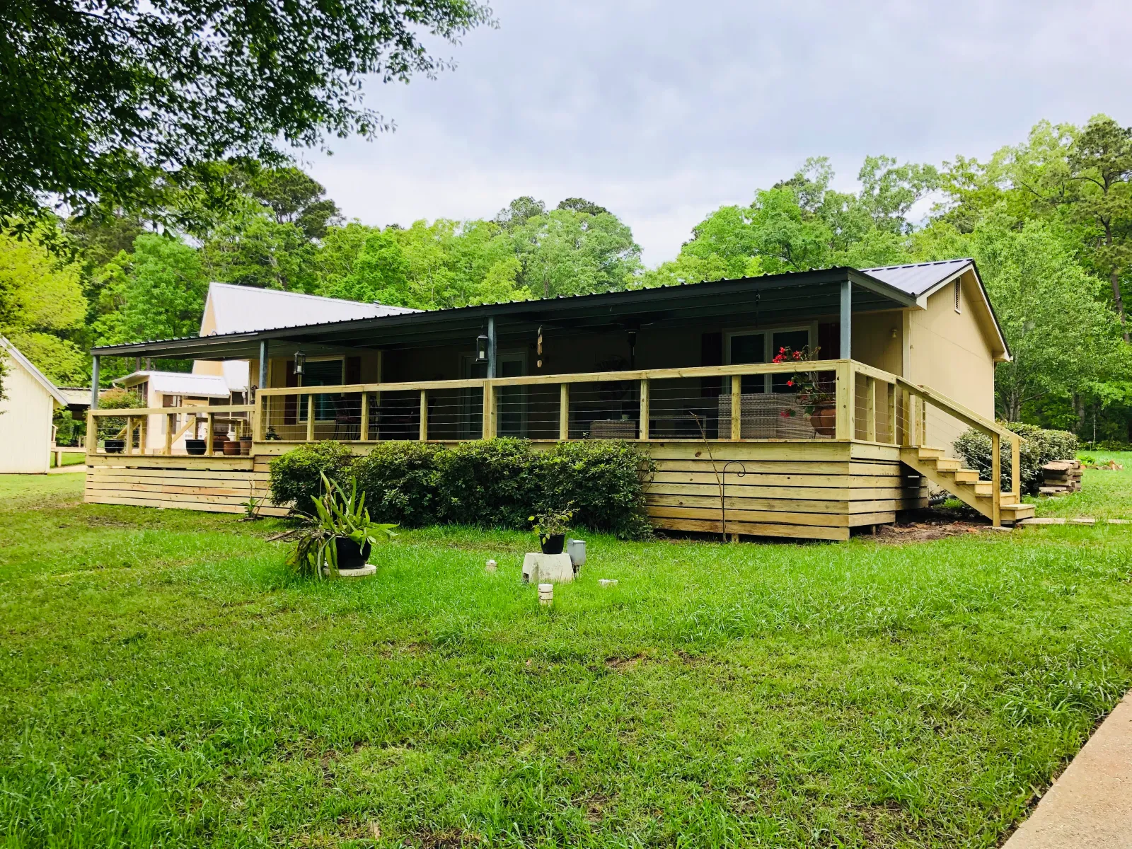 Metal roof on a ranch home with a covered porch in East Texas