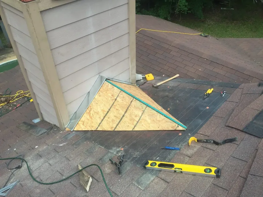 Roof Ryders repairing a damaged roof in Lufkin, Texas