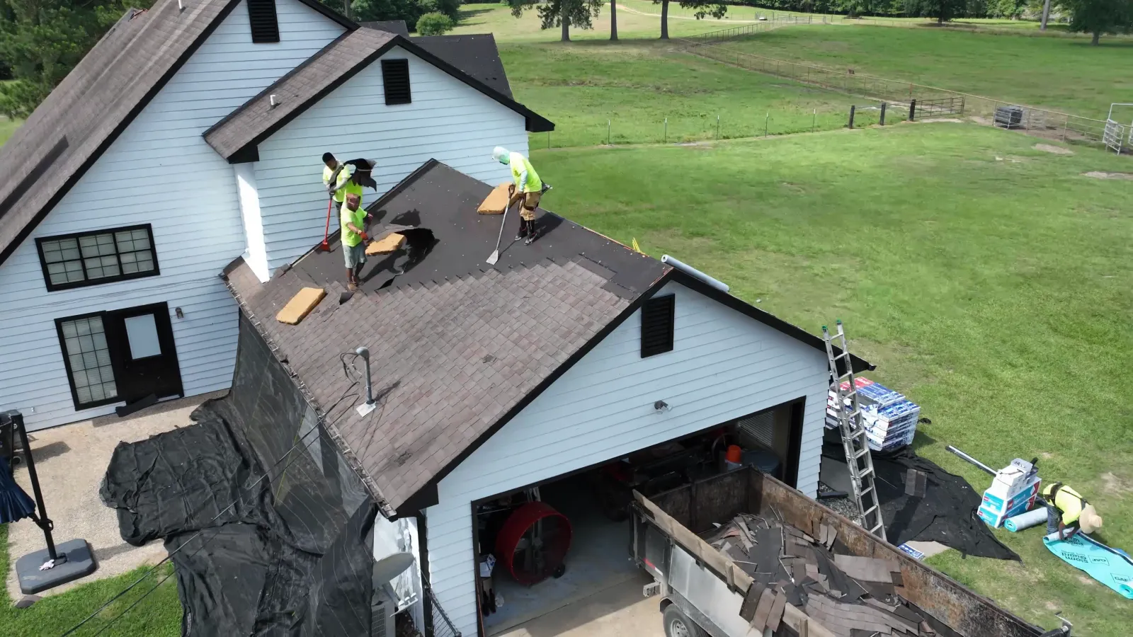 Residential roof cleaning and surface preparation