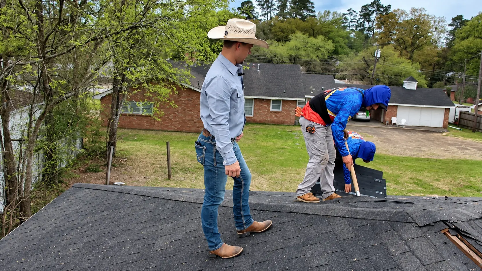 Roof Ryders owner reviewing a shingle roof